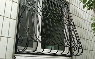 фото дутой кованой решетки